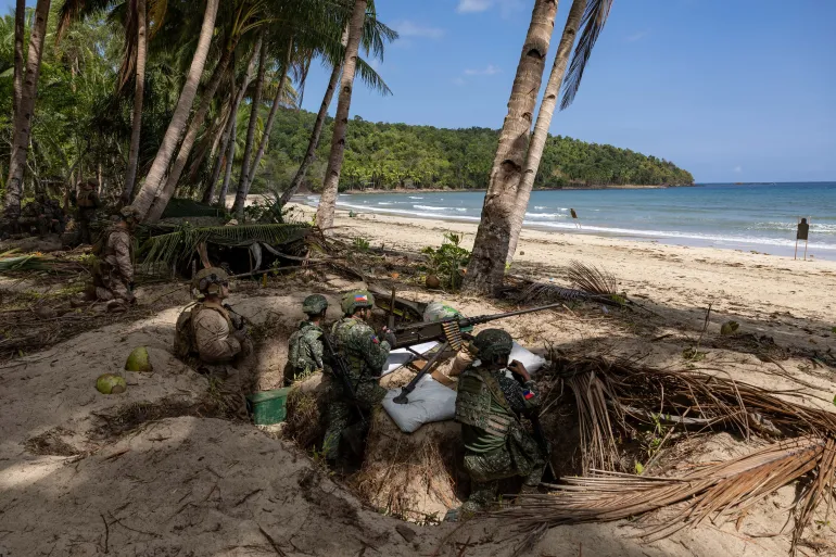 U.S. and Philippine troops participate in counter-landing live-fire exercises during Balikatan, the annual joint military exercises between the U.S. and the Philippines, at Long Point Beach, Brgy. Aporawan, Aborlan, Palawan, Philippines, April 27, 2026. REUTERS/Eloisa Lopez