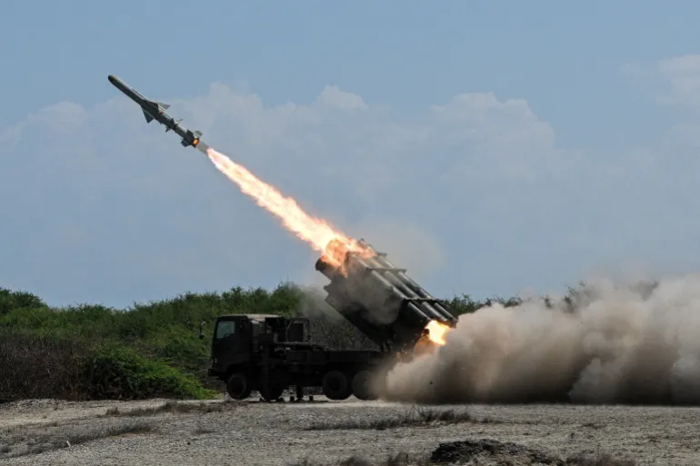 A Japan Ground Self-Defense Force (JGSDF) Type 88 surface-to-ship missile launcher fires during the Joint Task Force (JTF) Maritime Strike, part of Balikatan, the annual joint military exercises between the United States and the Philippines, at Culili Point Sand Dunes, Paoay, Ilocos Norte province, Philippines, May 6, 2026. REUTERS/Noel Celis TPX IMAGES OF THE DAY