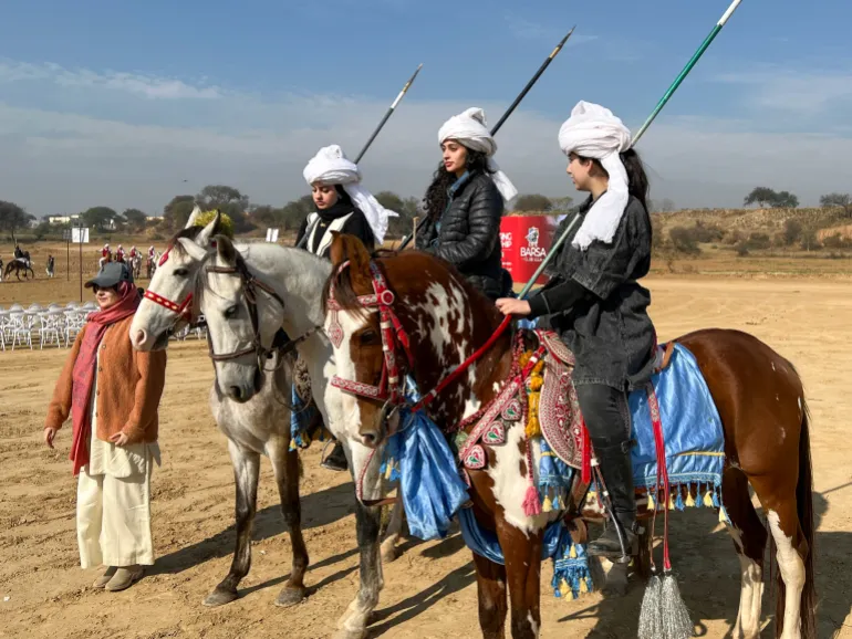 A team of young women riders warm up for a practice session in Rawalpindi, Pakistan [Mutee Ur Rehman/Al Jazeera]