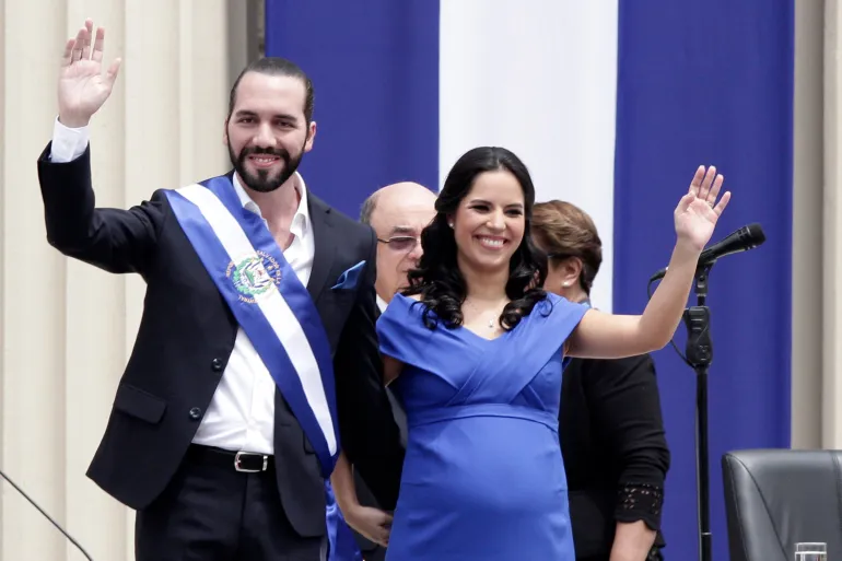Nayib Bukele and his wife, Gabriela Rodríguez de Bukele, wave during his inauguration in San Salvador on June 1, 2019, after his election as one of Latin America’s youngest leaders.