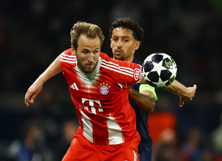 Football football - Ligue des champions de l'UEFA - semi finale - première étape - Paris St Germain / Bayern Munich - Parc des Princes, Paris, France - 28 avril 2026 Harry Kane du Bayern Munich en action avec Marquinhos REUTERS/Sarah Meyssonnier de Paris St Germain