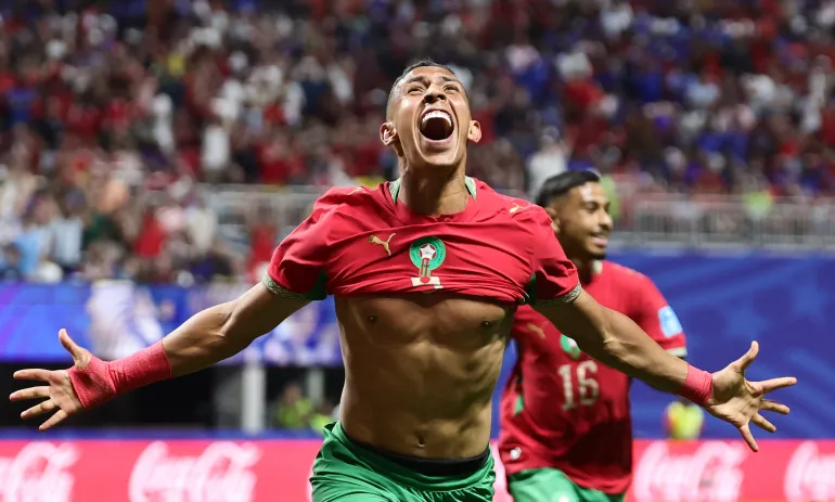 epaselect epa13062318 Soufiane Rahimi du Maroc célèbre après avoir obtenu l'avance de 3-2 lors du match de groupe de la coupe du monde de la FIFA 2026, le Maroc contre Haïti, à Atlanta, Géorgie, États-Unis, le 24 juin 2026. EPA/RONALD WITTEK