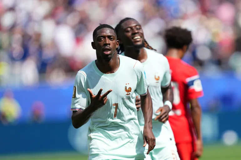 Le Français Ousmane Dembélé célèbre après avoir marqué le troisième but de son équipe lors du match de football du Groupe I de la Coupe du monde entre la Norvège et la France à Foxborough, Massachusetts, près de Boston, le vendredi 26 juin 2026. (AP Photo/Martin Meissner)