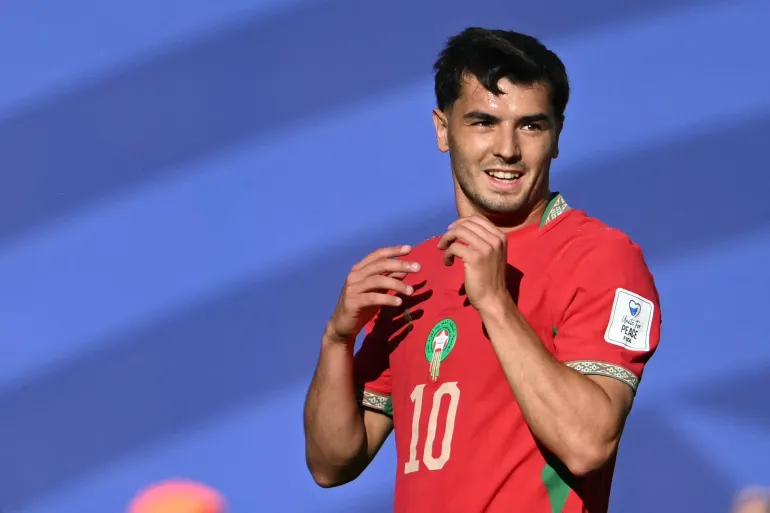 L'attaquant marocain n°10 Brahim Diaz réagit après avoir raté une occasion lors du match de football du Groupe C de la Coupe du monde 2026 entre le Brésil et le Maroc au New York/New Jersey Stadium à East Rutherford, le 13 juin 2026. (Photo de Mauro PIMENTEL / AFP)