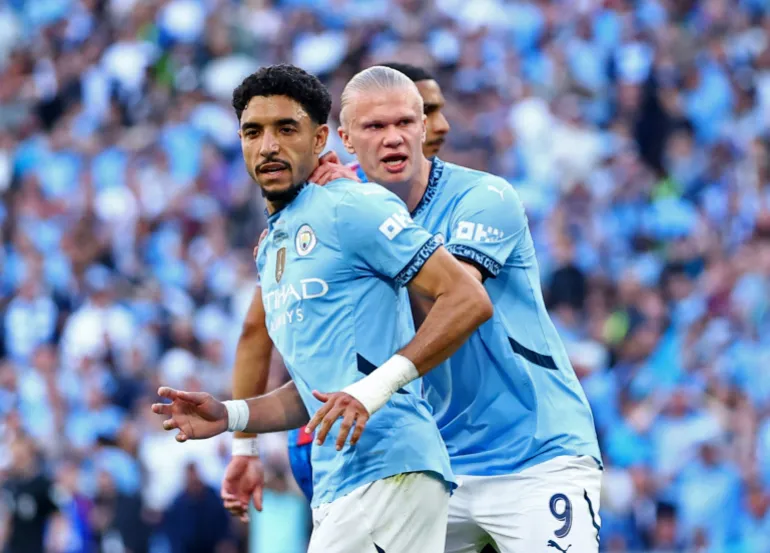 Manchester City forwards Omar Marmoush, left, and Erling Haaland helped their club to a season-high 77 goals in 38 Premier League fixtures last season